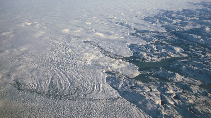 Clouds, like blankets, trap heat and are melting the Greenland Ice Sheet